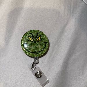 Grinch badge reel